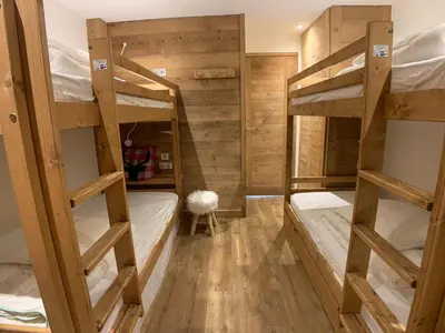 Un ou plusieurs lits dans un hébergement de l'établissement MyHome - Spacieux T4 rénové au cœur du Val Claret - 8pax