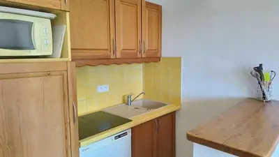 Cuisine ou kitchenette dans l'établissement Paradiski proche des pistes plan peisey