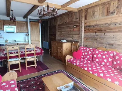 Coin salon dans l'établissement Paradiski pied des pistes plan peisey