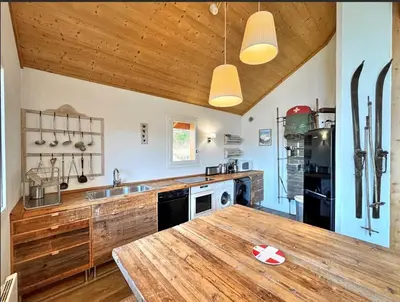 Cuisine ou kitchenette dans l'établissement L'ours Et L'ange