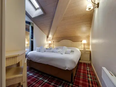 Un ou plusieurs lits dans un hébergement de l'établissement Arc 1950 - Apt 2 Chambres, Skis aux Pieds, 4 Adultes + 2 Enfants - FR-1-686-59