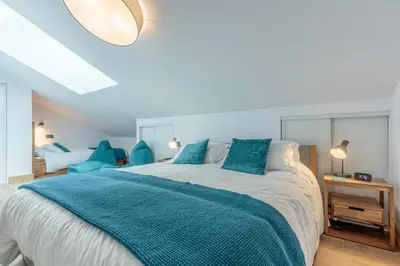 Un ou plusieurs lits dans un hébergement de l'établissement Bellecôte – superbe appartement chaleureux vue montagne