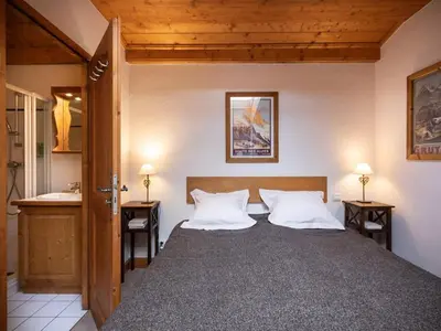 Un ou plusieurs lits dans un hébergement de l'établissement Duplex aux Arcs 1800, 3 chambres, skis aux pieds - FR-1-352-106