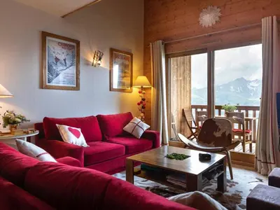 Coin salon dans l'établissement Duplex aux Arcs 1800, 3 chambres, skis aux pieds - FR-1-352-106