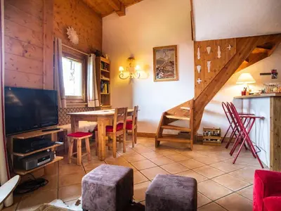 Coin salon dans l'établissement Duplex aux Arcs 1800, 3 chambres, skis aux pieds - FR-1-352-106