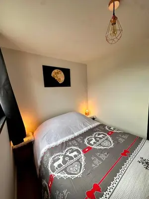Un ou plusieurs lits dans un hébergement de l'établissement Au Coeur de Lou - Studio 4 Pers Snowfront