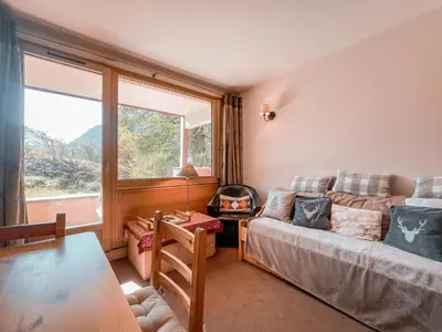 Coin salon dans l'établissement Appartement calme 2 pièces, 6 personnes, garage, Val d'Isère - FR-1-411-992
