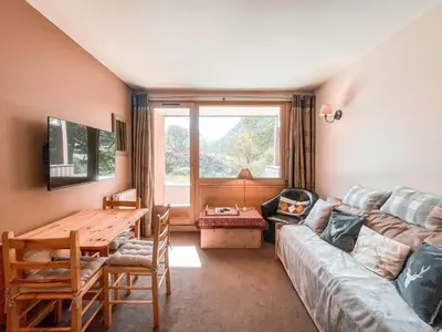Coin salon dans l'établissement Appartement calme 2 pièces, 6 personnes, garage, Val d'Isère - FR-1-411-992