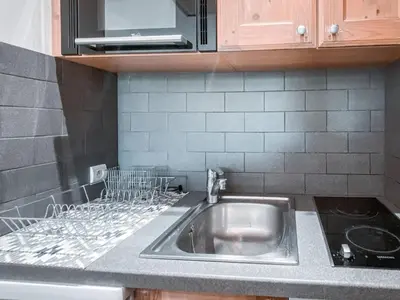 Cuisine ou kitchenette dans l'établissement Appartement calme 2 pièces, 6 personnes, garage, Val d'Isère - FR-1-411-992