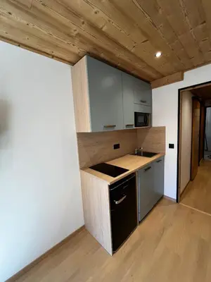 Cuisine ou kitchenette dans l'établissement Magnifique studio neuf 4 pers - Val Claret