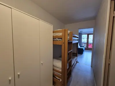 Un ou plusieurs lits dans un hébergement de l'établissement Charmant studio - Val Claret 4pers