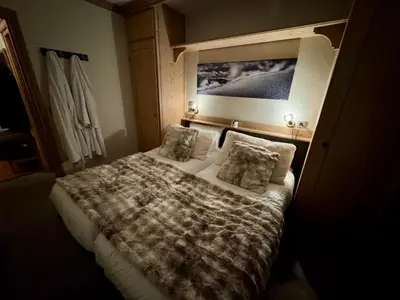 Un ou plusieurs lits dans un hébergement de l'établissement Cozy 1 Bedroom - Arc 1950 - Hameau du Glacier