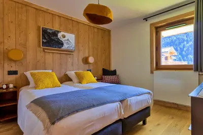 Un ou plusieurs lits dans un hébergement de l'établissement Carina - Superbe appartement à 5 min des télécabines