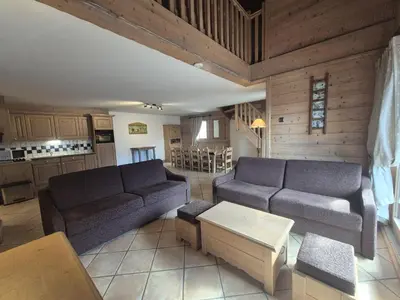 Coin salon dans l'établissement Superbe appartement 8pers - St Foy Station