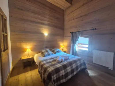 Un ou plusieurs lits dans un hébergement de l'établissement Superbe appartement 8pers - St Foy Station