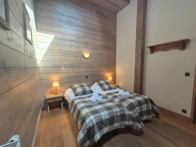 Un ou plusieurs lits dans un hébergement de l'établissement Superbe appartement 8pers - St Foy Station
