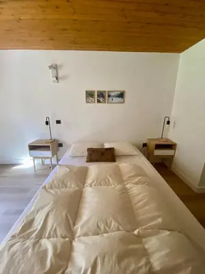 Un ou plusieurs lits dans un hébergement de l'établissement Chalet Alice
