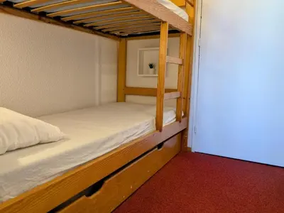 Un ou plusieurs lits dans un hébergement de l'établissement Studio 4 pers, Arc 2000, proche pistes - FR-1-411-991
