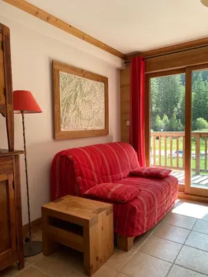 Coin salon dans l'établissement T3 lumineux Champagny le Haut