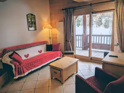 Un ou plusieurs lits dans un hébergement de l'établissement Duplex tout confort pied des pistes