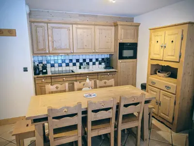 Cuisine ou kitchenette dans l'établissement Duplex tout confort pied des pistes