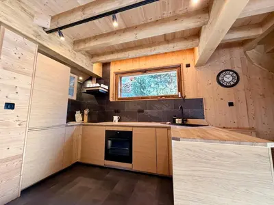 Cuisine ou kitchenette dans l'établissement Chalet Perle des Alpes