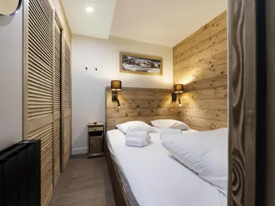 Un ou plusieurs lits dans un hébergement de l'établissement Résidence Val D'isere Village - Appartement entièrement rénové, au pied des pistes MAE-7473