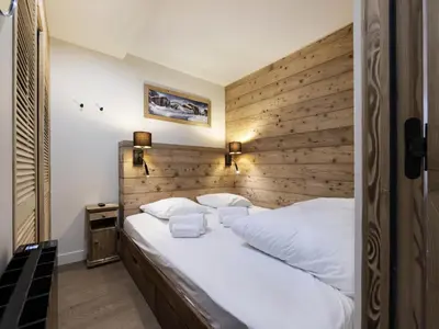 Un ou plusieurs lits dans un hébergement de l'établissement Résidence Val D'isere Village - Appartement entièrement rénové, au pied des pistes MAE-7473