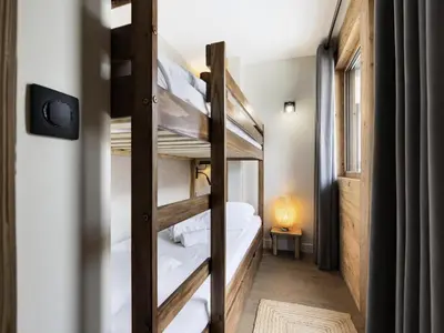 Un ou plusieurs lits dans un hébergement de l'établissement Résidence Val D'isere Village - Appartement entièrement rénové, au pied des pistes MAE-7473
