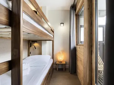 Un ou plusieurs lits dans un hébergement de l'établissement Résidence Val D'isere Village - Appartement entièrement rénové, au pied des pistes MAE-7473