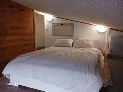 Un ou plusieurs lits dans un hébergement de l'établissement Beau duplex 6 pers, Les Arcs 1800, animaux admis - FR-1-411-942