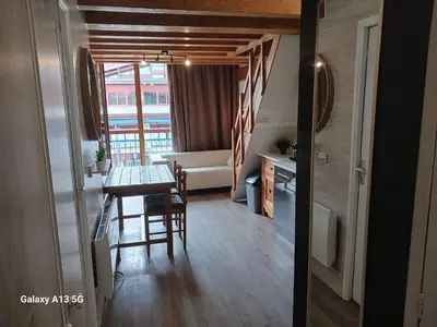 Coin salon dans l'établissement Beau duplex 6 pers, Les Arcs 1800, animaux admis - FR-1-411-942