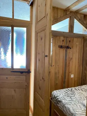 Un ou plusieurs lits dans un hébergement de l'établissement Studio avec terrasse plein sud vu montagne