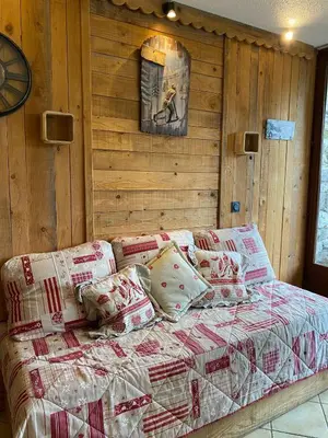 Un ou plusieurs lits dans un hébergement de l'établissement Studio avec terrasse plein sud vu montagne