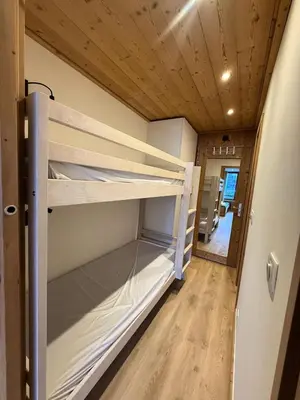 Un ou plusieurs lits dans un hébergement de l'établissement Résidence Prariond B - Studio rénové·Pieds des pistes ·Balcon MAE-0303