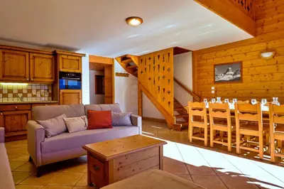 Coin salon dans l'établissement Rochu 10 personnes Spa, Calme & Vue Montagne