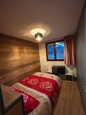 Un ou plusieurs lits dans un hébergement de l'établissement Appartement cosy quartier Napoléon