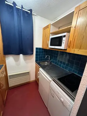 Cuisine ou kitchenette dans l'établissement Appartement cosy quartier Napoléon