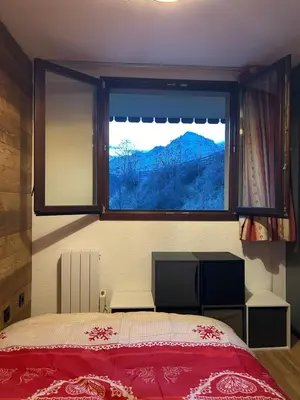 Un ou plusieurs lits dans un hébergement de l'établissement Appartement cosy quartier Napoléon