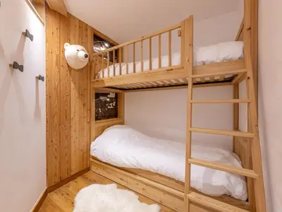 Un ou plusieurs lits dans un hébergement de l'établissement Appartement charmant avec wifi et terrasse sud - FR-1-694-436