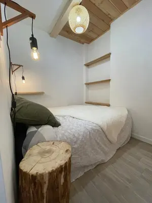 Un ou plusieurs lits dans un hébergement de l'établissement Charmant appartement au coeur de Val Cenis