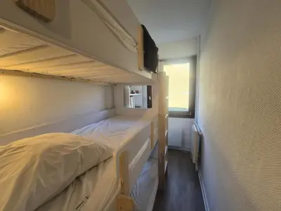Un ou plusieurs lits dans un hébergement de l'établissement Résidence Bec Rouge - Appartement lumineux rénové·Skis aux pieds·Balcon MAE-4953