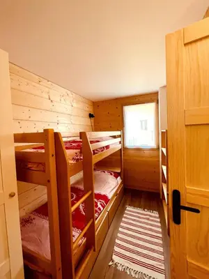 Un ou plusieurs lits dans un hébergement de l'établissement Appt 4 people - Cîmes Scolette
