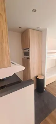 Cuisine ou kitchenette dans l'établissement Appartement vue imprenable Résidence Croix du Sud