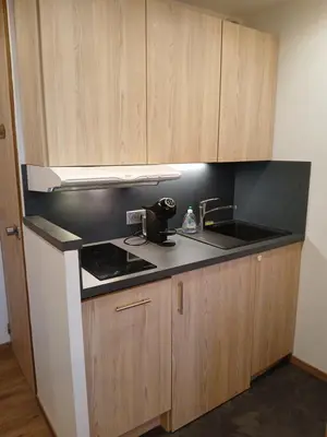 Cuisine ou kitchenette dans l'établissement Appartement vue imprenable Résidence Croix du Sud