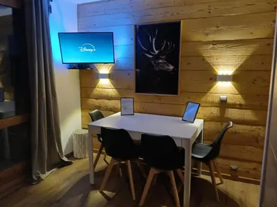 Télévision ou salle de divertissement dans l'établissement Appartement vue imprenable Résidence Croix du Sud