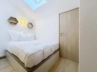 Un ou plusieurs lits dans un hébergement de l'établissement New Duplex 147 m Modern, Spacious 13 people
