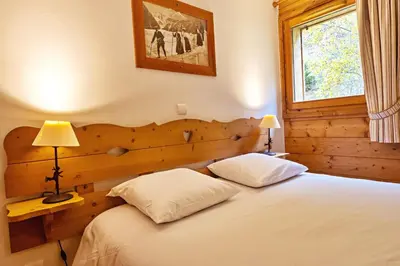 Un ou plusieurs lits dans un hébergement de l'établissement Bijolin 4/6 personnes, Spa & Terrasse