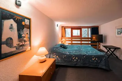 Un ou plusieurs lits dans un hébergement de l'établissement Résidence Vogel - Agréable duplex 6 personnes avec une très belle vue sur la vallée dans le village de Charmettoger à Arc 1800 MAE-9633