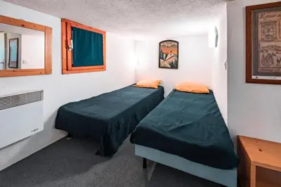 Un ou plusieurs lits dans un hébergement de l'établissement Résidence Vogel - Agréable duplex 6 personnes avec une très belle vue sur la vallée dans le village de Charmettoger à Arc 1800 MAE-9633